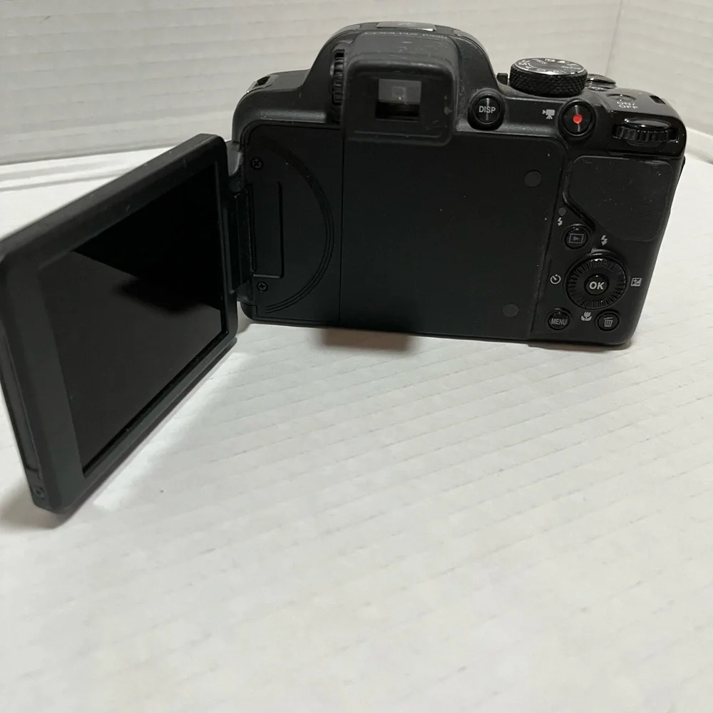 Black used untested Nikon, Coolpix 520